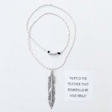 "HOPE IS THE FEATHER THAT REMINDS US WE HAVE WINGS"